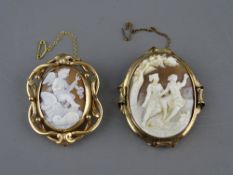 A LARGE YELLOW METAL FRAMED CAMEO BROOCH of two ladies beneath a tree and a believed gold scroll