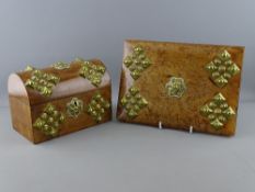 A VICTORIAN DOME TOPPED BURR WALNUT STATIONERY BOX having brass embellishments and satin lined lid