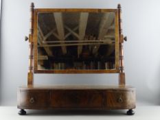 A REGENCY MAHOGANY SWING TOILET MIRROR on twist carved and turned supports on a three drawer