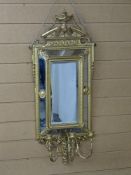 A 19th CENTURY GILT CUSHION FRAME TRIPLE SCONCE WALL MIRROR with urn swag pediment and gesso leaf