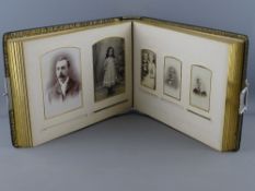 A FINE WELSH FAMILY PHOTOGRAPH ALBUM with metal clasp, full of family photographs and including a
