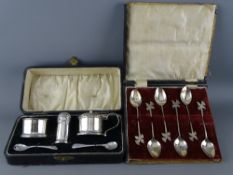 A CASED SILVER CONDIMENT SET and a set of six daffodil decorated silver teaspoons, Birmingham 1932