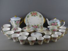 THIRTY SEVEN PIECES OF SHELLEY BONE CHINA HAND PAINTED TEA & COFFEEWARE with a similarly decorated