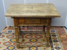 AN EARLY FLEMISH OAK SINGLE DRAWER TABLE, the reduced lift-off top with star inlay, the base section