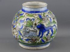A QAJAR DYNASTY PERSIAN POTTERY BULBOUS VASE decorated with lions and deer amongst flora in
