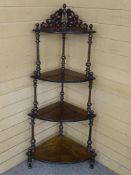 A VICTORIAN FOUR TIER WALNUT WHATNOT, the shelves with boxwood string inlay, 135 cms high
