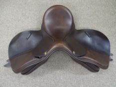 A 17 ins ENGLISH LEATHER GENERAL PURPOSE SADDLE by Adam Ellis, Walsall with Roma padded case, saddle