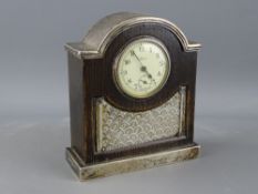 A SILVER MOUNTED OAK MINIATURE MANTEL CLOCK, Birmingham 1921, 10 cms high