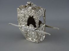AN ORNATE SILVER MODEL OF A SEDAN CHAIR, London 1895 import marks for Berthold Muller, having