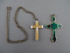 A MALACHITE & YELLOW METAL CRUCIFIX and a small metal mounted wooden crucifix with white metal