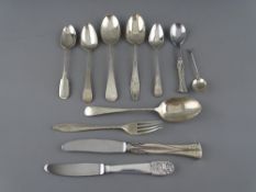 EIGHT PIECES OF ENGLISH SILVER FLATWARE and three Scandinavian silver handled items, 5.6 troy ozs