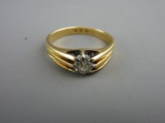 AN EIGHTEEN CARAT GOLD DIAMOND SOLITAIRE RING, the 0.50 carat stone in a raised claw setting, 5mm