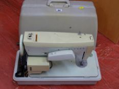 Cased Singer sewing machine E/T
