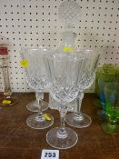 Square based decanter and stopper and four good glasses