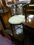 Arts & Crafts style occasional table with floral top decoration and a floral upholstered inlaid