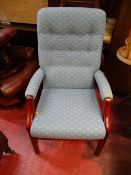 Dark wood light blue upholstered armchair