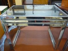 Modern glass and chrome nest of three tables