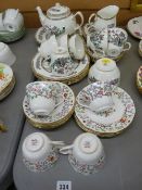 Four trios of Spode 'Shanghai' teaware and a Duchess 'Indian Tree' bone china part tea service