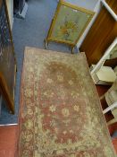 Tapestry tilt top firescreen table and a pink rug