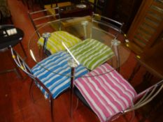 Chrome and glass circular table with four matching chrome chairs