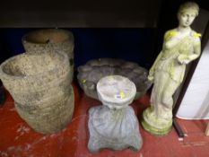 Parcel of four reconstituted stone garden barrel shaped planters, a shell shaped garden ornament and