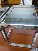 Modern glass and chrome nest of three tables