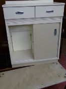 Stone topped wrought iron conservatory table and a painted two drawer, two door cupboard
