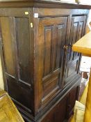 Antique oak press cupboard of neat proportions, fashioned from other items of furniture