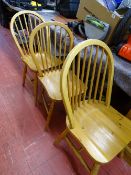 Three hoop shaped spindleback farmhouse chairs