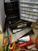 Plastic toolbox and contents and a small plastic chest containing screws and fixings, two bow saws