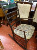 Dark wood ladderback rocking chair