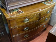 Bow front chest of two short over two long drawers
