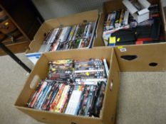 Three boxes with large quantity of DVDs