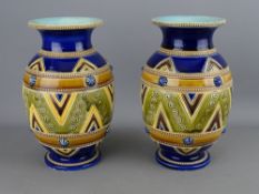 Pair of Sarreguemines vases with raised and incised decoration