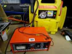 Absaar battery charger and a yellow Elitech battery pack E/T