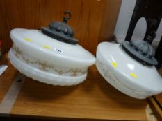 Two excellent milk glass and metal vintage ceiling shades