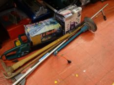 Boxed Black & Decker electric chainsaw, a grass strimmer, a Ronseal power sprayer and a quantity