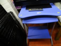 Blue computer desk and a Jardin rotary clothes dryer