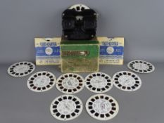 Vintage bakelite Viewmaster stereoscope with a quantity of view cards and original box