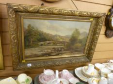 W T G? gilt framed oil on canvas - fisherman near an arched bridge, initialled and dated 1895