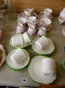 Twenty six piece Colclough pink and floral decorated teaset and an Art Deco style part teaset with