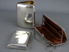 Two hallmarked silver cigarette cases and a lady's purse, 7 troy ozs gross