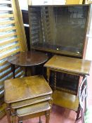 Two section glass sliding door bookshelf, a nest of three tables, circular occasional table and