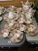 Highly decorative pink, green and gilt Victorian teaset comprising teapot, sucrier and milk jug, two