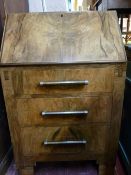 Compact walnut veneered three drawer writing bureau with interior sliding movement