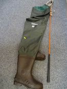 Pair of Daiwa waders and a carriage horse whip