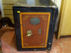 Vintage S Withers & Co metal safe with key, the handle formed as a fist gripping a bar