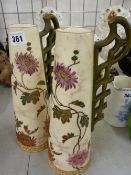 Pair of blush decorated conical shaped jugs