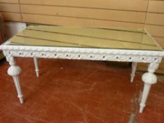 Ornate coffee table with glass bevelled edge mirror top