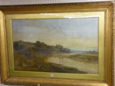 C L? SAUNDERS large gilt framed watercolour study depicting the banks of a tidal inlet with sheep